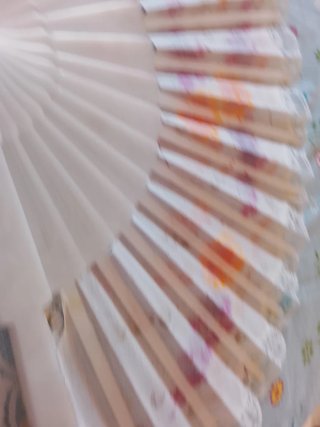 Abanico de tela con flores