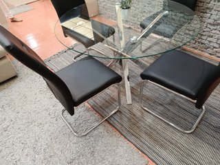 Mesa redonda cristal y 4 sillas negras