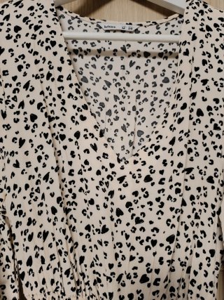 Vestido estampado beige y negro