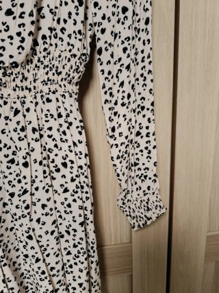 Vestido estampado beige y negro