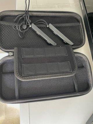 Nintendo Switch con mando Pro, juegos y funda