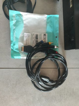 PlayStation 2 con 4 juegos y accesorios