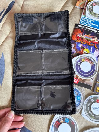 PSP 1004 Nero + 16 Giochi UMD