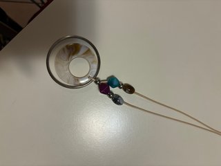 Collana con ciondolo cerchi e perline