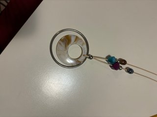 Collana con ciondolo cerchi e perline