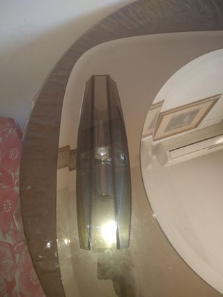 Espejo de cristal con lámparas