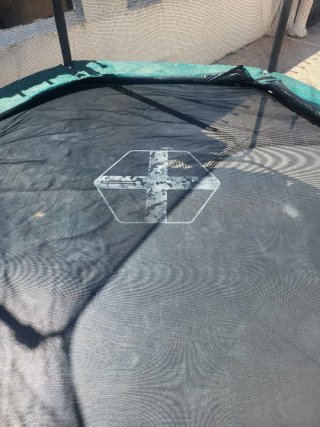 Cama elástica Decathlon con red de seguridad