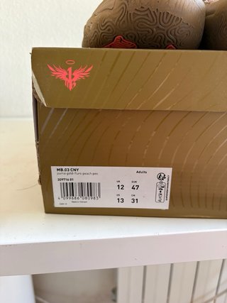 Zapatillas Baloncesto Puma Marrones y Naranjas