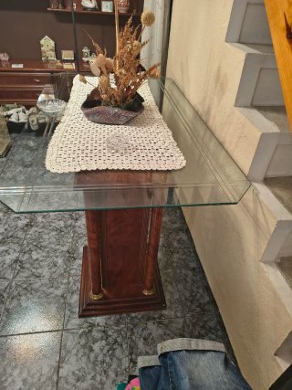 Mesa de comedor de cristal y madera