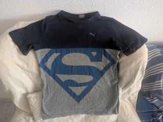 Camiseta Puma Superman niño. Talla 12-13