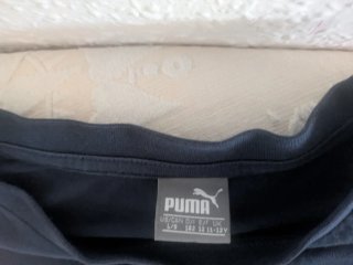 Camiseta Puma Superman niño. Talla 12-13