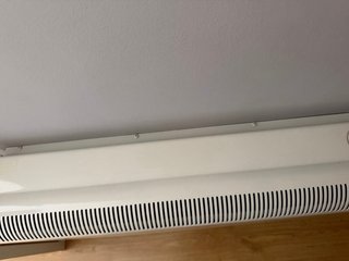 Radiador eléctrico beige y blanco