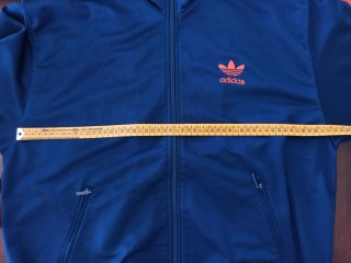 Chaqueta Adidas azul y naranja