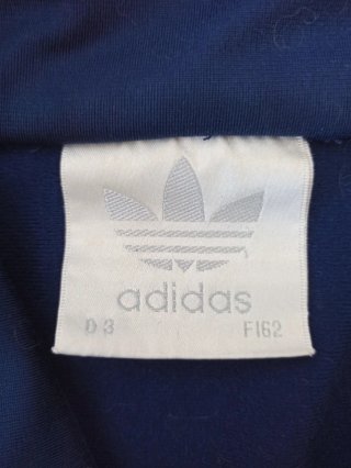 Chaqueta Adidas azul y naranja