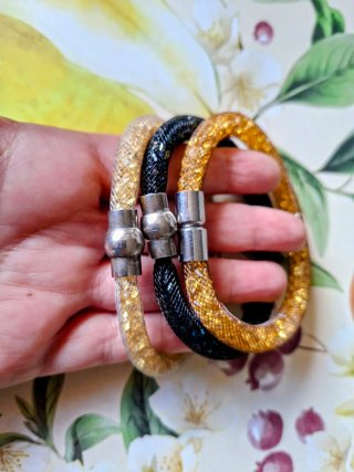 Tris braccialetti glitter neri e oro
