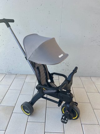 Triciclo Doona Gris