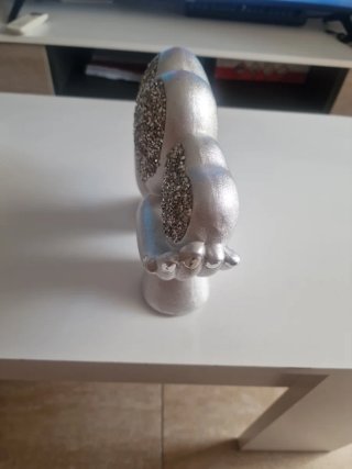 Figura decorativa de corazones plateados