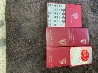 Libros y monedas SevillaFC