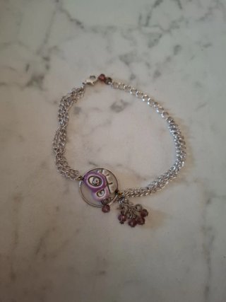 Bracciale con ciondolo e perline