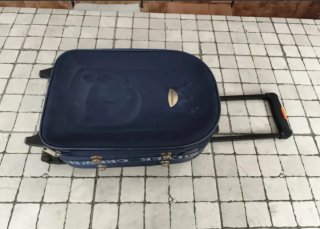 Pequeña maleta de viaje