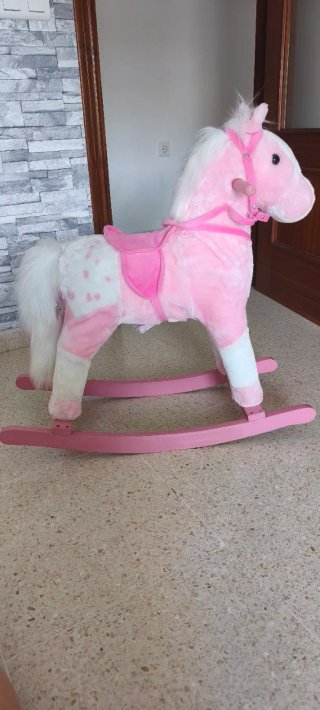 Caballo balancín rosa para niños