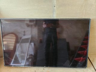 Televisión LG Negra pantalla rota 65 pulgadas