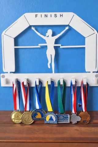 Medallero para medallas de running