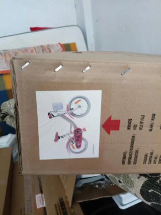 Bicicleta infantil rosa y blanca