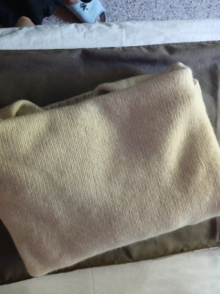 Poncho lana cuello alto ochos beige