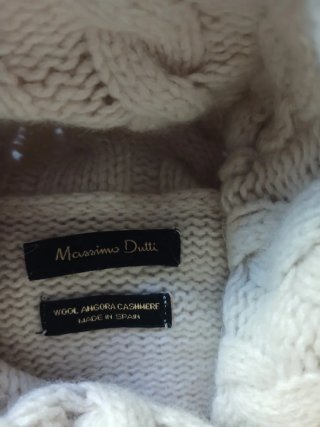 Poncho lana cuello alto ochos beige