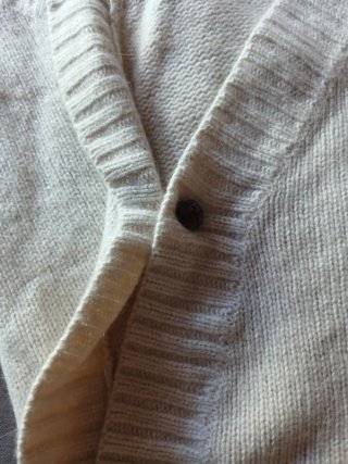 Poncho lana cuello alto ochos beige