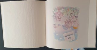 Álbum de fotos para bebés con diseño infantil