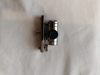 PSP Slim Argento + Fotocamera Sony + Caricatore Senza Batteria