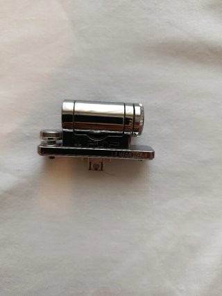 PSP Slim Argento + Fotocamera Sony + Caricatore Senza Batteria