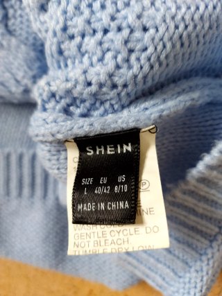 Jersey cuello alto azul