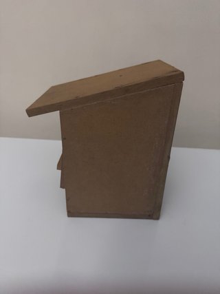 Casita para pájaros de madera