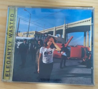 2 CDs INXS "The Greatest Hits" y "Eleganted wasted