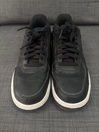 Nike Air Force 1 negras con línea blanca