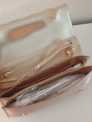 Bolso de mano dorado