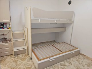 Letto a castello con scaletta e cassetti colombini