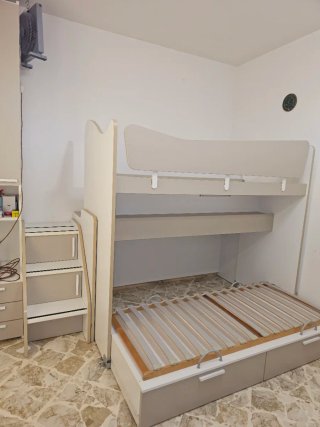Letto a castello con scaletta e cassetti colombini