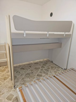 Letto a castello con scaletta e cassetti colombini