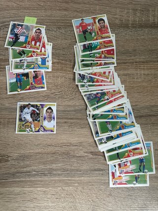 Lote Cromos Panini y Topps + Caja Almacenamiento