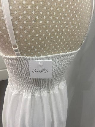 Vestido largo blanco con nudo frontal