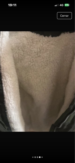 Parka verde con capucha y pelo