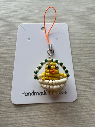 Charm Pollito en cesta