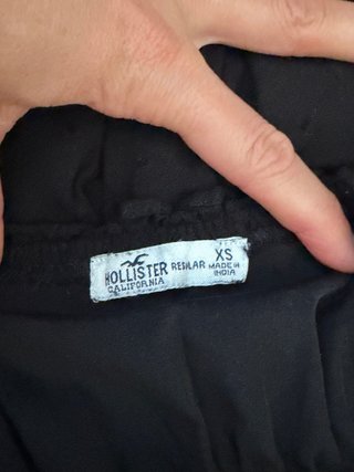 Vestido negro tipo mono con volantes