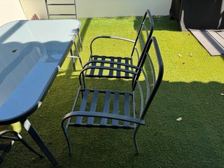 Mesa cristal y 6 sillas exterior