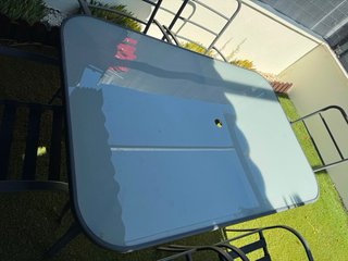 Mesa cristal y 6 sillas exterior