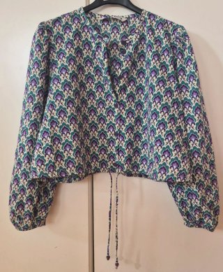 Blusa estampada manga larga